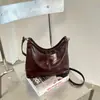 Nueva colección otoño/invierno 2026: Bolso de mano coreano simple, retro, moderno y versátil con un toque de alta gama, diseñado para mujeres, y se puede llevar como bandolera o bolso de hombro