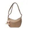 Bolsa de ombro de grande capacidade bolsa feminina 2024 nova tendência casual simples moda estudante universitário aula transversal bolsa de bolinho