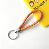 Llavero creativo llavero de cuerda de cuero cordón para llaves colgante de joyería cordón tejido fábrica de cuerda de cuero venta al por mayor