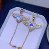 Collar de Piedra Lunar Natural con Alas de Ángel Cupido Simples de Venta Caliente para Mujer con Alas Pequeñas que se Pueden Mover