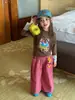 Ropa Infantil Weiniguo 2026 Otoño Nueva Ropa Infantil Camiseta de Color Bloque de Dibujos Animados para Niñas Camiseta Versátil para Jardín de Infancia
