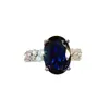 Anillo de Huevo de Paloma Diario Estilo Medieval Antiguo Vintage Alto Sentido Diamante de Alto Carbono Cristal Azul Puntiagudo Anillo para Mujer con Cambio de Luz