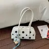 Bolso de hombro de diseño nicho transfronterizo 2026 nuevo lunares retro versátil bolso de mano simple para el trabajo bolso tipo bowling
