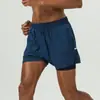 Pantalones cortos deportivos de secado rápido para hombre de verano 2 en 1 para correr, fitness, transpirables, de tres cuartos, con bolsillo para teléfono y tiras reflectantes