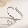 Pulsera y anillo de oro chapado con incrustaciones de diamantes, estilo europeo, transfronterizo, Amazon, moda, juego para mujer, joyería de pulsera de lujo al por mayor