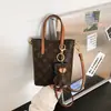 Bolsa Retro para Teléfono Móvil de Comercio Exterior para Mujer 2026 Nueva Bolso Cubo Súper Popular Bestseller Bolso Pequeño Bolso Cruzado Versátil de Gama Alta