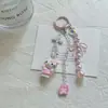 Colgante de Lazo de Hello Kitty de Dibujos Animados Borla de Perla Cadena de Muñeca para Teléfono Móvil con Cuentas Diseño Versátil de Lujo Ligero Personalizado