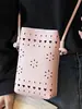 Bolso de Axila Estilo Coreano para Mujer 2026 Primavera Nuevo de Moda Bolso Cubo Hueco Bolso Cruzado de Alto Valor Gran Capacidad