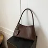 Bolsa de axila tejida de nicho de alta venta transfronteriza para mujer 2026 Nueva bolsa de mano Elegante de un solo hombro Bolsa para madre e hijo