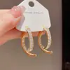 Pendientes de Cruz Reversibles con Tachuelas de Diamante Inspirados en el Diseño, Estilo Coreano, Geniales y Únicos, Pendientes Súper Brillantes al por Mayor