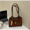 Bolso Retro de Ante de Nicho para Otoño e Invierno para Mujer 2025 Nuevo Estilo Versátil de Hombro o Axila con Bloques de Color para Viajes