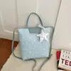 Outono de 2026 Novo Estilo Ins Bolsa de Mão Versátil Estrela Moda Bolsa de Compras Grande Capacidade Nicho Atacado Bolsas Femininas