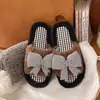 Pantuflas de casa para mujer, informales, con lazo, a cuadros, 2026, antideslizantes, planas, de felpa, nuevo estilo slip-on para otoño e invierno