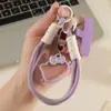 Lindo cordón para teléfono de gato KT, correa para teléfono de bloqueo de color dopamina, accesorio de muñeca para cámara de teléfono, cordón corto para teléfono para niñas