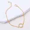 Joias de Moda Transfronteiriças Europeias e Americanas, Pulseira de Cobre Banhada a Ouro 18K Simples e Estilosa com Pingente Redondo Vazado de Zircônia de Cristal