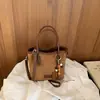 Bolso de cubo retro transfronterizo para mujer, 2026, de alta gama, elegante y moderno, adecuado para el trabajo diario, se puede llevar en la mano o usar como bolso de hombro o bolso cruzado