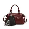 Bolso Retro Boston Pu para Mujer 2025 Nuevo Versátil para Viajar al Trabajo Hombro Cruzado Pequeño Cuadrado Portátil Tipo Almohada