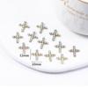 Fábrica de joyería de metal para uñas con cruz de diamante transfronteriza taladro de uñas aleación tridimensional nueva decoración de uñas postizas al por mayor