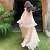 Vestido de costas abertas com gola halter estilo francês de Yi Mengling para mulheres, estilo de férias na praia, vestido de camadas plissadas, vestido longo de fada