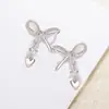 Novos Brincos Minimalistas com Laço Coração Zircônia e Franja, Brincos de Nicho Exquisitos, Brincos de Temperamento Doce e Cool para Mulheres