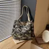 2026 Nuevo Estilo Coreano Nicho Gran Capacidad Moda Versátil Bolso Tote de Hombro Único Resistente al Desgaste Bolso de Mano para Viajes de Mujeres