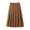 Venta al por mayor de verano transfronteriza 2025 Moda europea y americana Nuevo traje de chaqueta de manga corta bicolor con falda plisada de flor de capullo de linterna