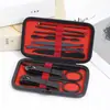 Acero al carbono Negro 11 piezas cortaúñas traje de belleza cortaúñas juego completo cortaúñas juego de herramientas de manicura Mayoreo