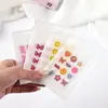 Parches para acné de dibujos animados en stock, lindo gato, conejo, cerdito, parches de acné de hidrogel, pegatinas de acné florales coloridas