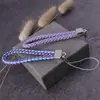 Lanyard para teléfono móvil al por mayor de fábrica, cordón para llavero de cámara de cuero PU, cuerda de muñeca para teléfono móvil de pareja, cuerda tejida de cuero