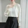 Tiro real 2025 camisa de satén color albaricoque francés diseño de primavera para mujer top ajustado de temperamento chic
