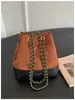 Bolso moderno y de moda con un toque exclusivo y de nicho, bolso de axila para mujer, nuevo bolso de hombro versátil vintage para mujer Otoño 2025
