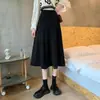 Falda midi de color sólido beige con drapeado de otoño e invierno, cintura alta, corte A ceñido, falda larga de verano para mujer, falda negra z