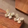 Pendientes de Botón de Plata Moda Estilo Festivo Exquisito Incrustados con Circonita Perla Trébol de Cuatro Hojas Mariposa Cola de Pez con un Toque de Lujo