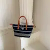 2026 Verão Novo Tecido de Malha Listrado Bolsa de Ombro Único Feminina Grande Capacidade Casual Versátil Bolsa de Axila Bolsa Transversal para o Trabalho