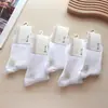 Calcetines de doble jeringa para otoño e invierno niños Haibaina nuevos gruesos color liso calcetines de algodón a rayas para mujer venta al por mayor
