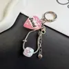 Popular cadena de hueso de serpiente con colgante de letra graffiti, cadena para teléfono, nuevo llavero creativo de moda, accesorio para bolso