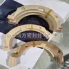 Suministro de piezas no estándar de poliéter éter cetona relleno de PTFE, piezas de forma especial modificadas con PTFE relleno de PEEK