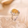 Anillo retro de moda Yilu plata S990 plata pura chapado en oro ámbar de sangre de cera de abeja flor hoja superficie de huevo hueco anillo de plata