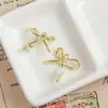 Una Variedad de Colgantes de Lazo de Aleación Dulces y Frescos Joyería Hecha a Mano DIY Collares de Mano Pendientes Colgantes Accesorios Materiales