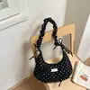 Bolso bandolera de gran capacidad estilo coreano casual minimalista nicho femenino lunares plisado bajo el brazo 2026 nuevo