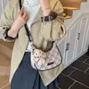 Bolso de Lúnula de Nicho para Mujer 2025 Nuevo Portátil para Viajes y Trabajo Bolso de Axila Bolso de Hombro Único Estilo Lúnula Bolso Pequeño