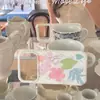 Fondo Blanco con Bordes Redondeados, Lunares y Flores Pintadas a Mano Funda para Teléfono Manzana 17Promax Adecuada para 16Promax/15Pro/14P