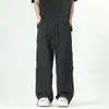 Pantalones casuales nuevos de primavera y verano para hombres y mujeres, pantalones de pierna ancha holgados de color liso con cremallera, diseño de malla a rayas, pantalones largos de estilo callejero