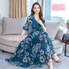 Vestido Longo Feminino Floral de Verão Acima do Joelho Vestido Feminino Estampado Vestido de Manga Curta com Decote V de Comprimento Médio Vestido de Mangas Sino Linha A