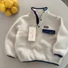 Sudadera infantil 2026, nueva colección de otoño, unisex, diseño color block, cuello alto, suéter pullover para bebé, moderno