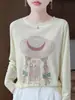 Nueva colección de principios de otoño de 2026: Camiseta de punto de cuello redondo y manga larga, corte holgado, efecto adelgazante, elegante, versátil, ligera, cómoda y presenta un diseño estampado