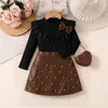 Conjunto de Duas Peças Outono 2026: Blusa com Gola Babado Texturizada de Gola Redonda + Saia de Couro PU com Contas