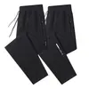 Calças casuais masculinas de outono e inverno, espessadas, largas, versáteis, calças compridas, calças casuais, calças de moletom esportivas, modernas e versáteis