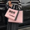 Bolsa no tejida con recubrimiento en polvo color glaciar portátil material nuevo LOGO tienda de ropa bolsa para ropa mujer alta gama simple