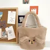 Amazon cross-border supply/Bolsa de pelúcia de urso, bolsa de mão positiva e negativa de uso duplo, bolsa de lã de cordeiro para inverno, bolsa de múmia